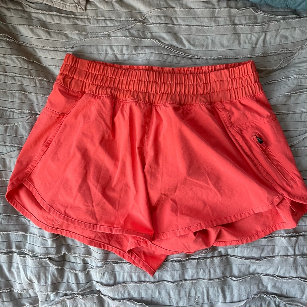 Lululemon shorts size 8 in a bright coral color